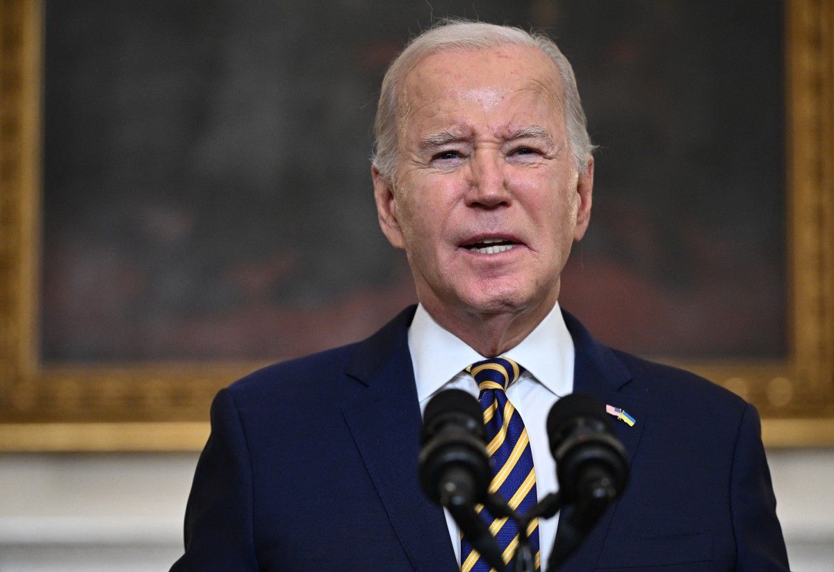 Biden Signs $1.2T Spending Bill, Boosts Defense Spending